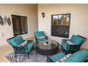 View of screened in patio with comfortable seating and tasteful decor at 7235 River Hammock Dr # 204, Bradenton, FL 34212