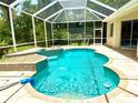 Backyard screened in pool and spa has ample room for entertaining and relaxing by the water at 2809 112Th E Ter, Parrish, FL 34219