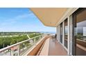 Expansive balcony with seating and panoramic views of the Intracoastal Waterway and surrounding landscape at 3060 Grand Bay Blvd # 182, Longboat Key, FL 34228