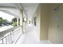 Bright hallway with white columns, offering a welcoming and well-lit entrance to the condos at 3803 54Th W Dr # 201, Bradenton, FL 34210