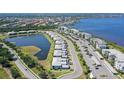 Enjoy this community's serene lake views and many amenities including parking, waterways and mature landscaping at 1017 Tidewater Shores Loop # 1017, Bradenton, FL 34208