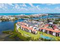 Aerial view of a waterfront community with bay and ocean views at 1608 Stickney Point Rd # 304, Sarasota, FL 34231