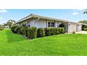 Charming single-story home with well-kept lawn and mature hedges at 3649 Somerville Dr # 1507, Sarasota, FL 34232