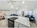 Spacious kitchen with sleek countertops, stainless steel appliances, and a large island with seating at 55 Braden Castle Dr, Bradenton, FL 34208