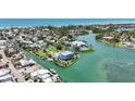 Beautiful coastal community featuring luxury homes with private docks and serene waterfront views at 630 De Narvaez Dr, Longboat Key, FL 34228