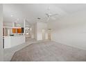 View from living room showing the foyer and kitchen with breakfast bar at 6552 Meandering Way, Lakewood Ranch, FL 34202