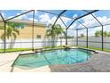 Relaxing screened-in pool area with crystal-clear water and beautiful paver deck at 7379 47Th Avenue E Cir, Bradenton, FL 34203