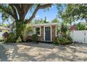 Inviting home exterior showcasing stone accents and beautiful landscaping at 1019 S Tuttle Ave, Sarasota, FL 34237