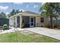 Exterior showcasing the screened patio, backyard, and convenient shed for additional storage at 3411 15Th E St, Ellenton, FL 34222
