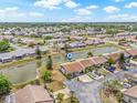 Stunning aerial view of a residential community, showcasing well-maintained homes and scenic waterfront property at 3901 41St W St, Bradenton, FL 34205