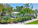Single Gathering home with mature landscaping and a well manicured lawn at 643 Calle Del Otono, Sarasota, FL 34242