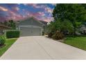 Charming single-story home featuring a well-maintained lawn and an attached two-car garage at 11254 82Nd St E, Parrish, FL 34219