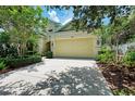 Lovely home with a well-maintained lawn, two-car garage, and a welcoming curb appeal at 12175 Maple Ridge Dr, Parrish, FL 34219