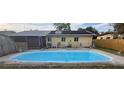 Backyard featuring an in-ground pool and a screened patio area at 2804 52Nd Avenue W Ter, Bradenton, FL 34207