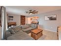 Comfortable living room featuring a spacious seating area, rustic wood accents, and modern decor at 3417 49Th W St, Bradenton, FL 34209