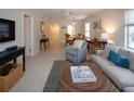 Spacious living room featuring comfortable seating and an open floor plan at 3745 Almeria Ave # 7S, Sarasota, FL 34239