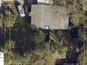 Aerial view of property showing the layout of the house and surrounding greenery at 7109 28Th E St, Sarasota, FL 34243