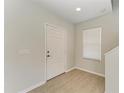 Bright entryway featuring tile flooring and a view of the staircase at 5420 River Sound Ter, Bradenton, FL 34208