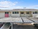 A view of a well-maintained condominium with covered parking at 2503 Beneva Rd # 7, Sarasota, FL 34232