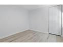 This is a simple bedroom with new flooring and a large closet for optimal storage at 2652 26Th St, Sarasota, FL 34234