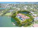 Luxury waterfront property with a sprawling layout, beautiful pool, and private dock at 3799 Flamingo Ave, Sarasota, FL 34242