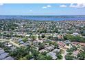Expansive aerial view of the neighborhood with mature trees and the property highlighted at 4603 4Th E Ave, Bradenton, FL 34208