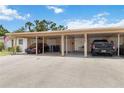 Carport with multiple parking spaces featuring ample room for vehicles and easy access to the home at 5062 White Oak Ct, Bradenton, FL 34207