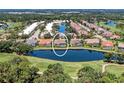 Community aerial view showcases water features and golf course highlighting this home's exceptional location at 5205 88Th E St, Bradenton, FL 34211