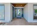 Inviting front entrance featuring a glass door, transom and sidelight at 1001 Point Of Rocks Rd # 207, Sarasota, FL 34242