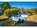 Waterfront property featuring a private boat dock for easy access to boating and water activities at 2159 Constitution Blvd, Sarasota, FL 34231