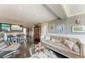 Inviting living room and dining area featuring modern decor, hardwood floors, and abundant natural light at 33 S Gulfstream Ave # 306, Sarasota, FL 34236