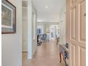 Inviting entry showcasing the home's bright interior and tile flooring at 3804 Amapola Ln, Sarasota, FL 34238