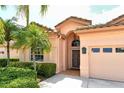Welcoming front facade showcasing a tile roof and tidy garden at 3804 Amapola Ln, Sarasota, FL 34238