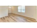 Inviting entryway featuring wood-look floors and natural light at 4206 Park Willow Ave, Palmetto, FL 34221