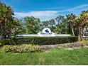 Welcome to Palm Aire, A Private Country Club, a community of lovely townhomes surrounded by lush landscaping at 6110 Country Club Way # 102, Sarasota, FL 34243