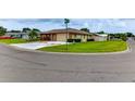 Charming home featuring well-kept lawn and landscaping on a corner lot, offering curb appeal at 8402 13Th Nw Ave, Bradenton, FL 34209