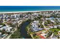 Beautiful aerial view of waterfront property, canal access, and proximity to the beach at 30 Island Cir, Sarasota, FL 34242