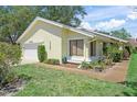 Attractive single-story home with lush landscaping around the home at 4109 Carriage Dr # 23, Sarasota, FL 34241