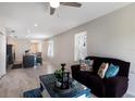 Open living space with tile flooring, soft natural light, and a cohesive design that flows seamlessly at 4739 Reisswood Loop, Palmetto, FL 34221
