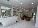 Modern lobby with a reception desk, stylish seating, and elegant decor that creates a welcoming atmosphere at 1345 2Nd St, Sarasota, FL 34236