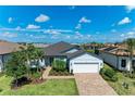Charming single-Gathering home with a well-kept lawn and lovely landscaping, located in a serene neighborhood at 7136 Summerland Cv, Bradenton, FL 34202