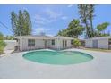 Backyard pool and lanai offers a great space for outdoor enjoyment at 2953 Oak St, Sarasota, FL 34237