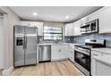 Beautiful updated kitchen with stainless steel appliances and modern cabinetry at 1409 57Th W St # 1409, Bradenton, FL 34209