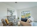 Cozy living room filled with natural light and neutral decor at 2081 Basin St, Port Charlotte, FL 33952