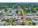 Aerial view of property in residential area, brick street, close to commercial, and glimpse of city skyline at 440 42Nd N St, St Petersburg, FL 33713