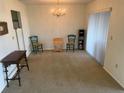 Cozy dining area with a chandelier that adds a touch of elegance at 3673 Somerville Dr # 1510, Sarasota, FL 34232