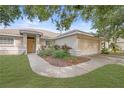 Well-maintained single-Gathering home with a two-car garage, tidy landscaping, and a inviting front entrance at 3415 68Th Street E Cir, Palmetto, FL 34221