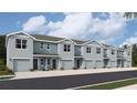 New townhomes showcase a modern design and a front-loading 1-car garage at 4310 Miller Point Ct, Bradenton, FL 34208