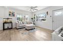 Inviting living room with natural light, neutral-toned furniture, and stylish decor at 4519 Brooksdale Dr, Sarasota, FL 34232