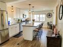 Bright and airy kitchen with modern appliances, an island, and lots of counter space at 10315 Cortez W Rd # 32-7, Bradenton, FL 34210